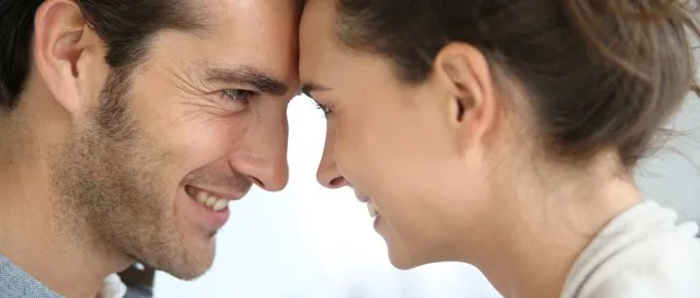 Profile of loving couple looking at each other