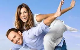 Young Man Carrying Woman On Back