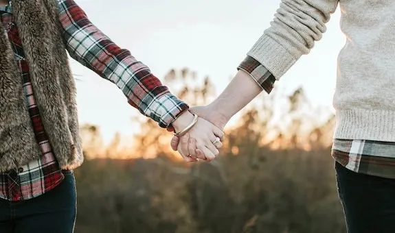 couple holding hands